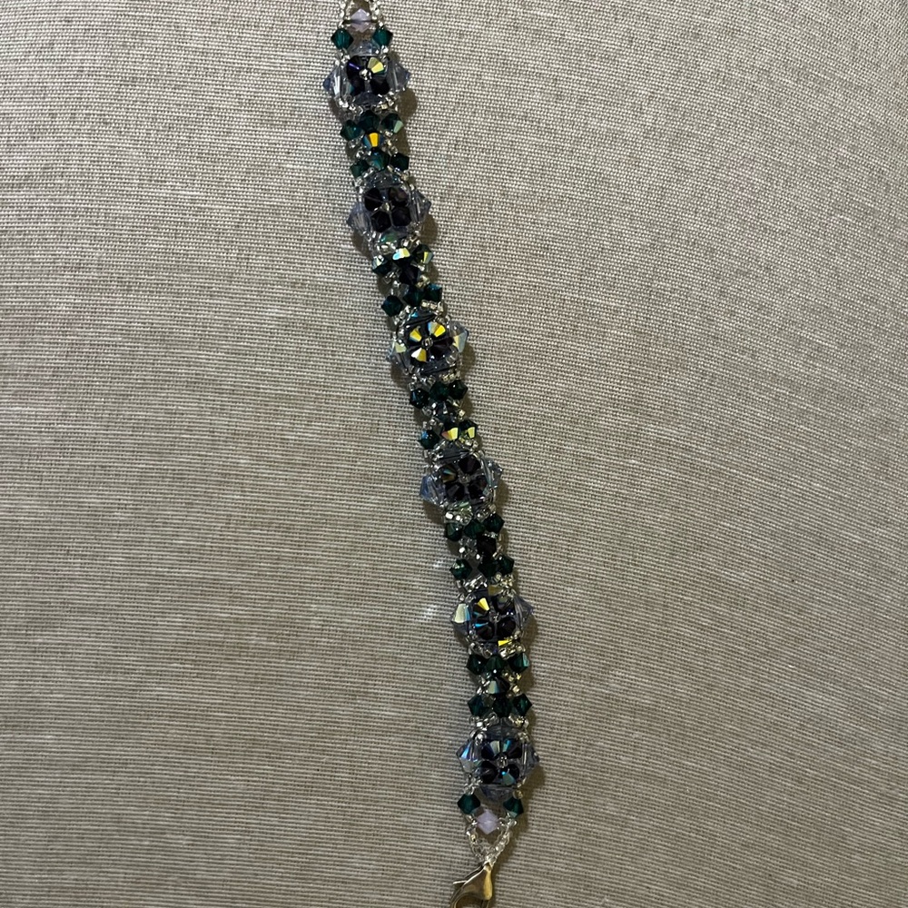 Elegant Green and Purple Bracelet with Intricate Design